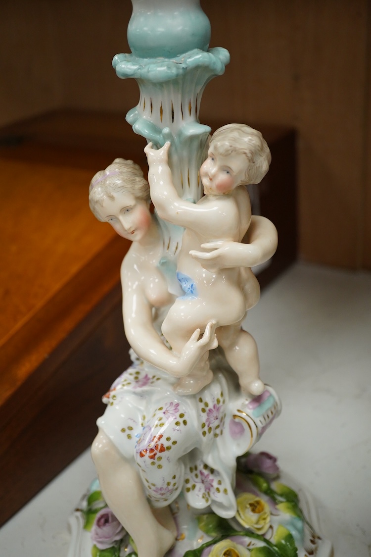 A pair of Jacob Petit porcelain figural candlesticks, 34cm